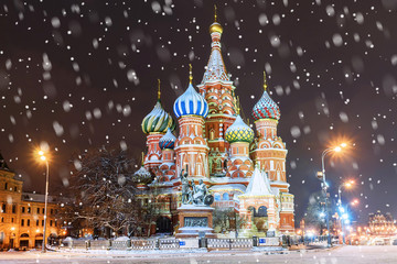 St. Basil's Cathedral in Moscow in winter.The inscription on the monument in Russian: Citizen Minin and Prince Pozharsky. Grateful Russia
