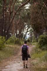 Obraz premium Photographer walk work backstage concept. Photo creating process. Unity with nature.