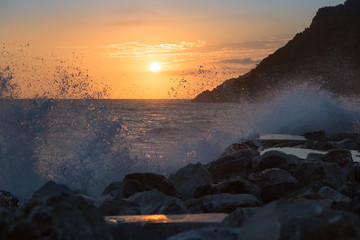 Rough and Choppy Sea, Waves, Rocks at Sunset