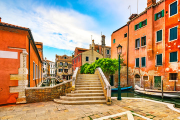 Venice cityscape, water canal, bridge and traditional buildings. Italy