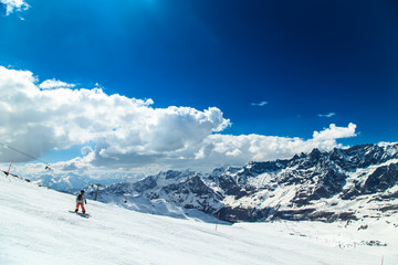 Naklejka na ściany i meble sunny day on the ski slopes of Cervinia