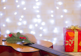 Christmas music background with guitar and red gift