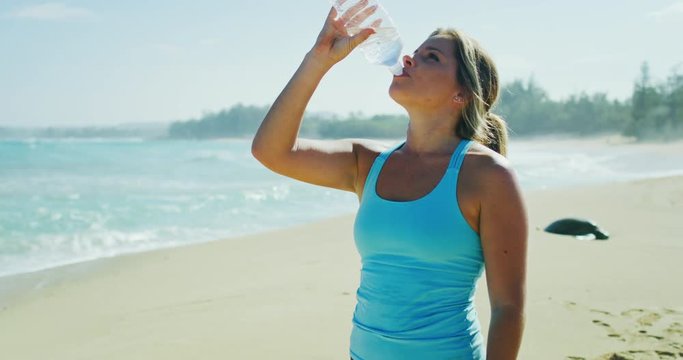 Woman Drining Water after Workout