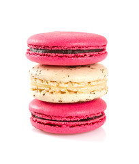 raspberry and vanilla macaroons isolated on white