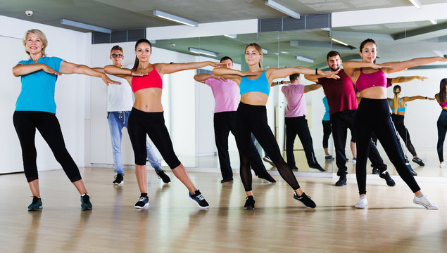 adults of different ages dancing at dance class