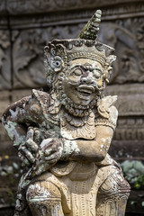 Traditional stone sculpture in temple. Ubud, island Bali, Indonesia