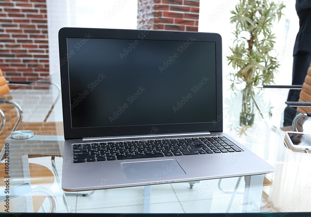 Canvas Prints open laptop on the desktop, in the conference room