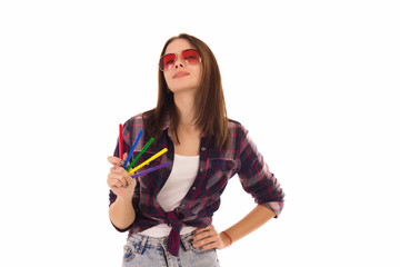 Young pretty woman with markers, isolated  