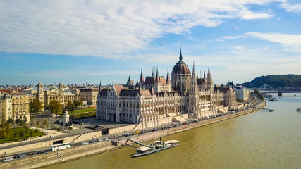 Fototapeta na wymiar Aerial footage from a drone shows the historical Buda Castle near the Danube on Castle Hill in Budapest, Hungary. Bridge on the river. Aerial view.