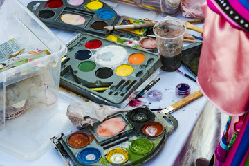 Open boxes with watercolors.