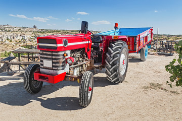 Vintage retro beautiful red wheeled Tractor in Cappadocia, Turkey