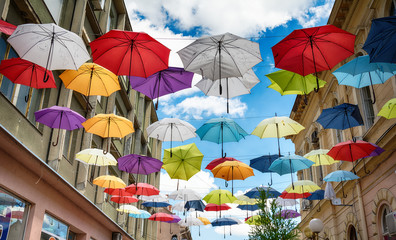 Fototapeta na wymiar Sombor, Serbia July 12, 2017: Umbrellas in Sombor on the street