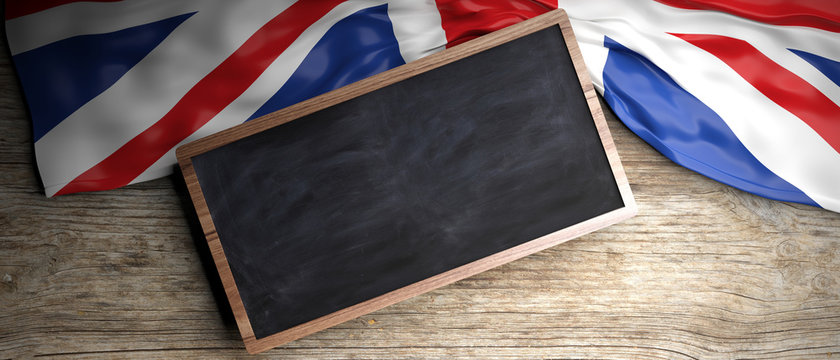 United Kingdom flag placed on wooden background. Blackboard in frame with copyspace. 3d illustration