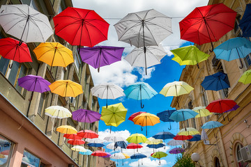 Fototapeta na wymiar Sombor, Serbia July 12, 2017: Umbrellas in Sombor on the street