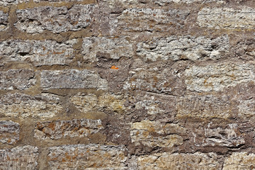 Close up of ancient yellow brick wall texture