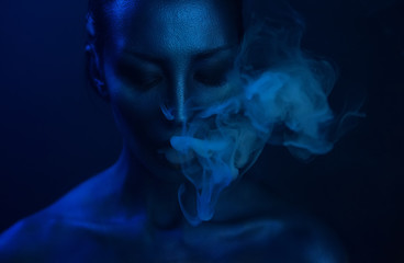 Vape Party, Nightlife. Beautiful Sexy Woman smoking