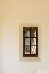 Wooden window stucco building