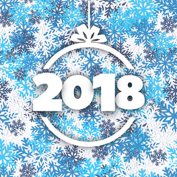 Concept design the paper ball and 2018 new year on background of bright snowflakes.