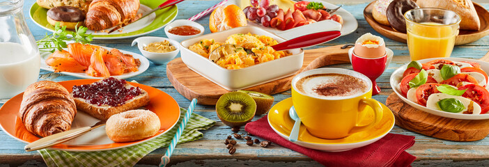 Colorful breakfast spread in a panoramic banner