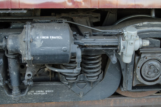 Close up view of a passenger car truck on an excursion train