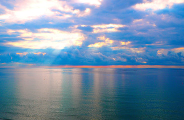 Beautiful sunrise in ocean, the bright colors of riot of colors