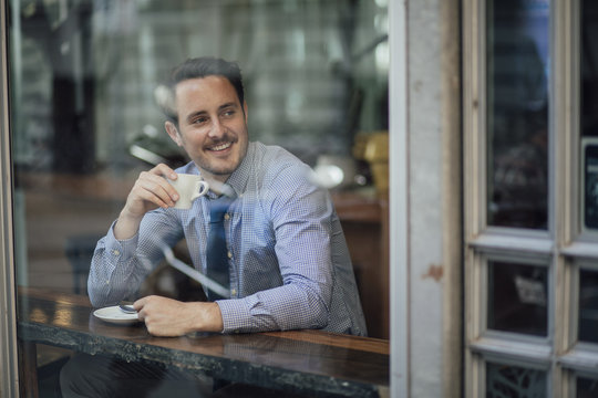 Businessman Enjoying A Coffee Before Work