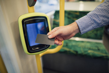 Paying TRam Fare With Contactless Card - obrazy, fototapety, plakaty