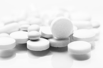 Pharmacy theme, white medicine tablets antibiotic pills.