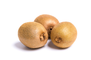 Fototapeta premium Three whole kiwis on a white background