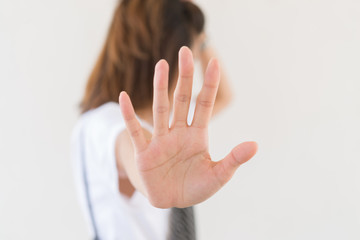 Asian woman make hand stop on white background