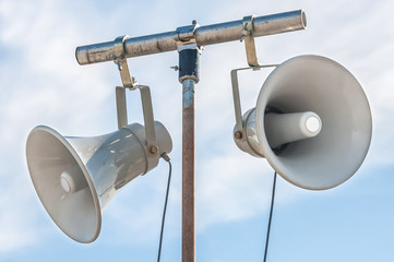 closeup of an outdoor event public address speakers