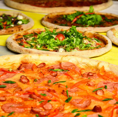 Delivery and italian cuisine concept. Spicy pizza with pepper bits