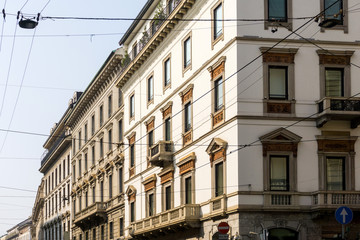 Fototapeta na wymiar Traditional antique city building in Milan, Italy