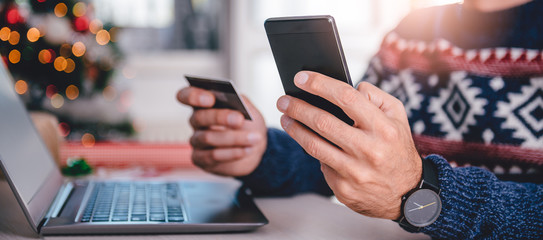 Men shopping online during christmas