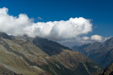Mountains and peaks landscape. Stubaier Gletscher covered with glaciers and snow, natural environment. Hiking in the Stubai Alps. Ski resort in Tirol, Austria, Europe