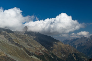 Mountains and peaks landscape. Stubaier Gletscher covered with glaciers and snow, natural environment. Hiking in the Stubai Alps. Ski resort in Tirol, Austria, Europe