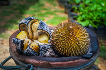 barbecue durian on stove.