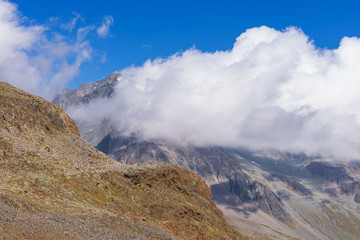 Mountains and peaks landscape. Stubaier Gletscher covered with glaciers and snow, natural environment. Hiking in the Stubai Alps. Ski resort in Tirol, Austria, Europe