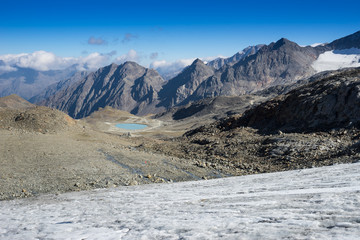 Mountains and peaks landscape. Stubaier Gletscher covered with glaciers and snow, natural environment. Hiking in the Stubai Alps. Ski resort in Tirol, Austria, Europe
