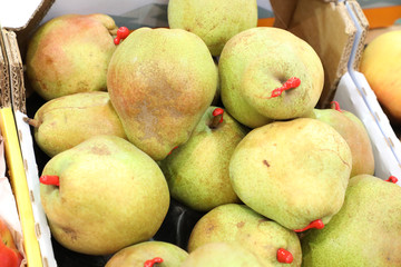 Fresh green pears at the market