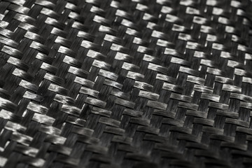 Carbon fiber raw composite texture close up
