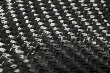 Fototapeta premium Carbon fiber raw composite texture close up