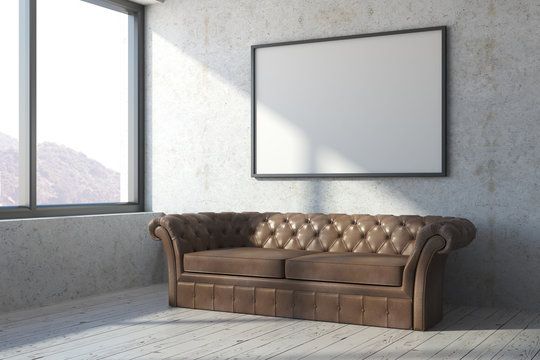 Brown leather sofa in concrete room