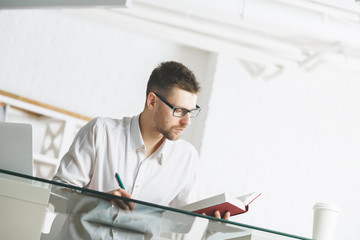 Caucasian businessman working on project