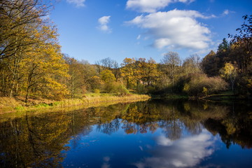 Fototapeta na wymiar Autumn lake near Pisek city, Czech republic.