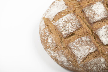 Round bread on white background. Isolated. Copy space.