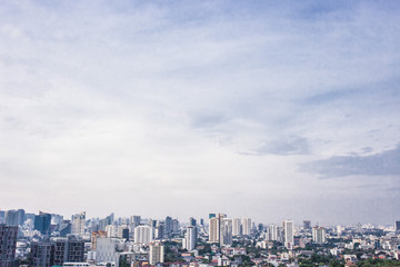 Fototapeta na wymiar city buildings with blue sky Asok Bangkok Thailand