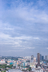 city buildings with blue sky