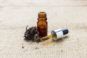 Medicinal cannabis with extract oil in a bottle