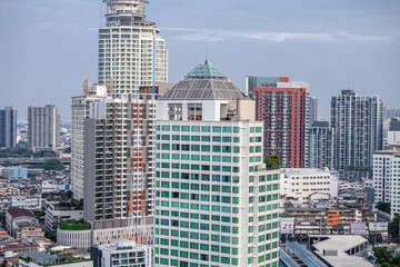 Sky view of city buildings with blue sky at Bangkok Thailand 